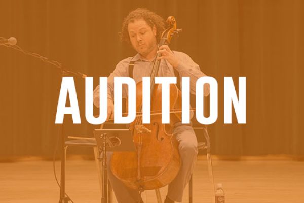 A orange-tinted image of a student playing the cello