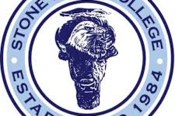 Stone Child logo; buffalo head with bald eagle head layered on top of it