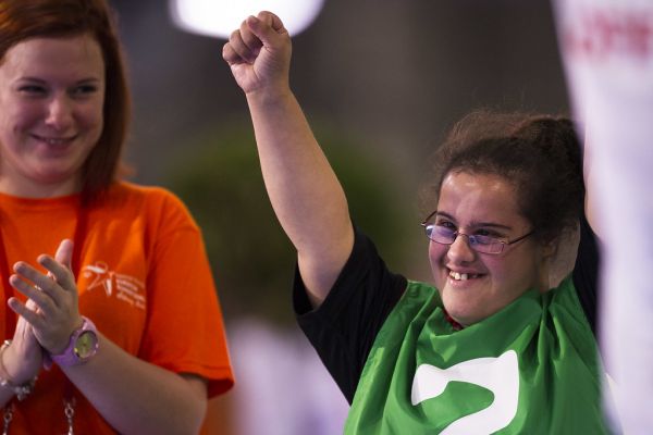 Two people with disabilities celebrating