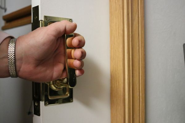 Hand on door handle