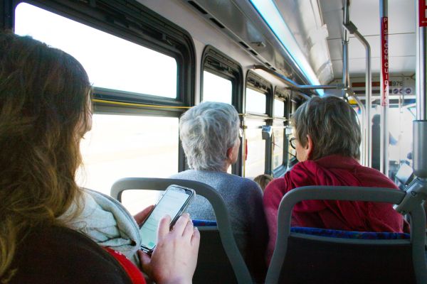 People riding a public bus