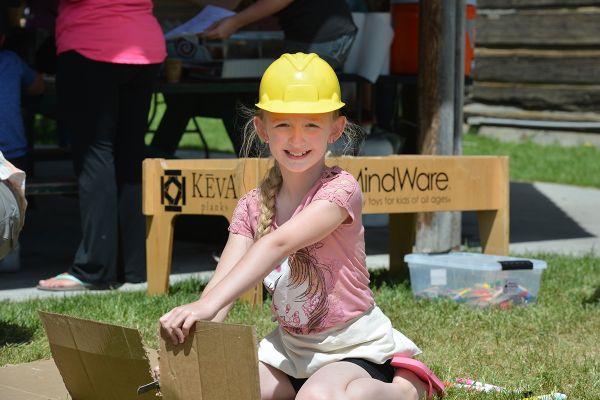 Girl doing cardboard construction