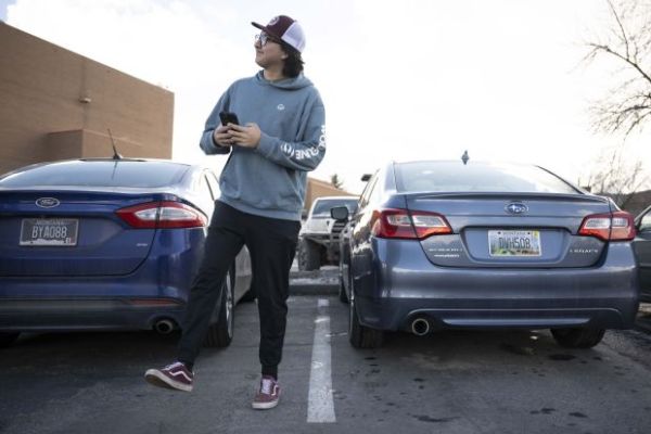 guy walking away from parking spot