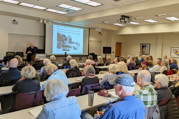 full classroom of students with teacher up front