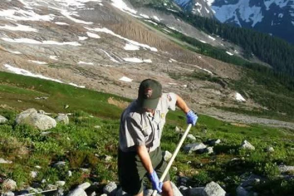 nps employee working in wilderness