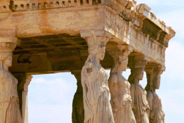 tops of columns carved to look like people on an ancient building