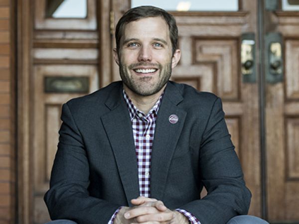 President Seth Bodnar sits on the stairs of Main Hall at UM