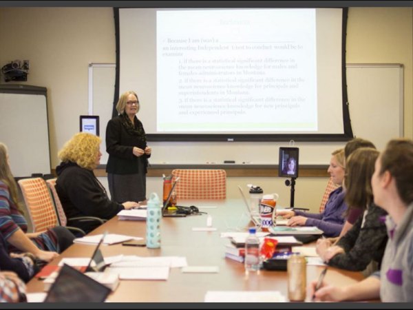 Faculty member teaching to students
