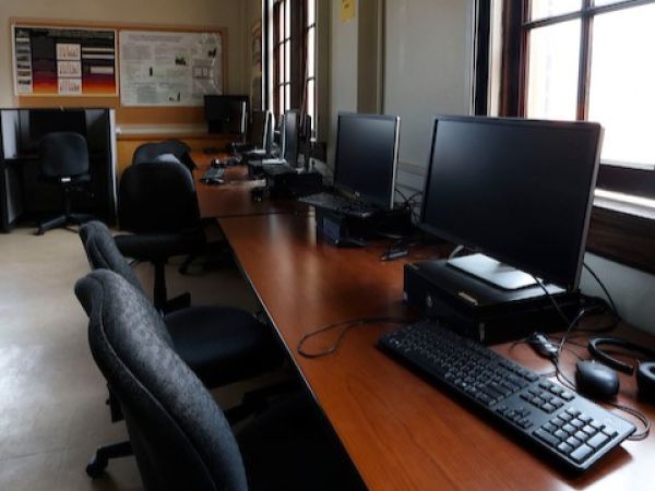 computer lab with several desktop computers