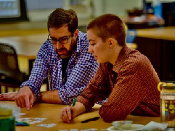 Faculty and student working together. 