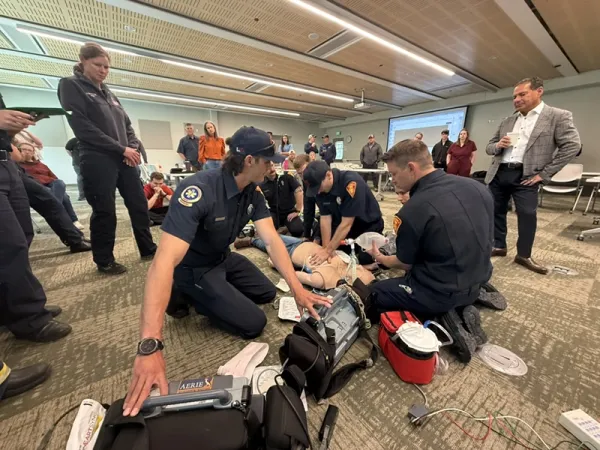 EMT's practicing on a dummy