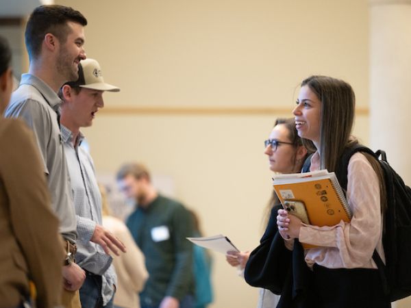 students talking to one another