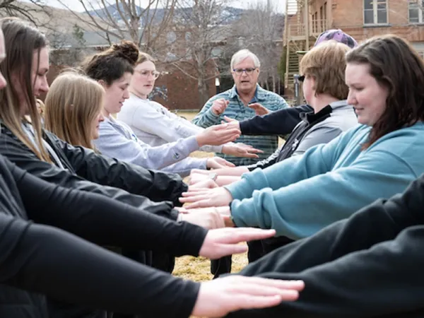 people playing a team building game