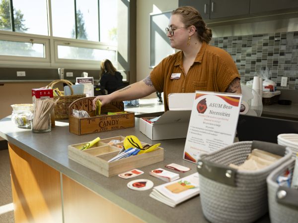 person working at heart and soul station