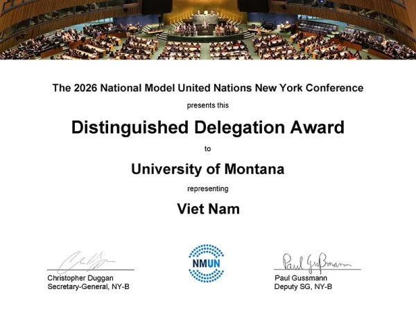 A certificate that says 'the 2026 national model united nations new york conference presents the distinguished delegation award to university of montana representing vietnam' with two signatures