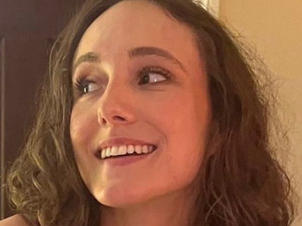 Girl smiling looking to the left