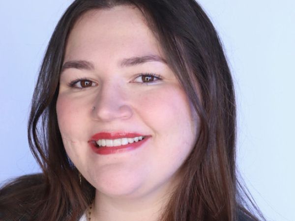 Courtney posing for a headshot