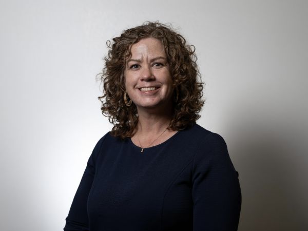 A professional headshot of Dr. Anisa Goforth