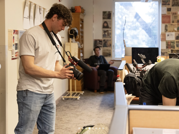 Students filming concert in the Kaimin