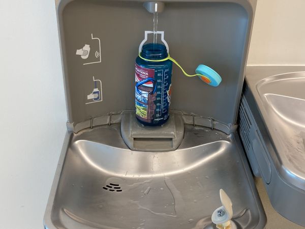 naglene water bottle being filled up at a water bottle filling station 