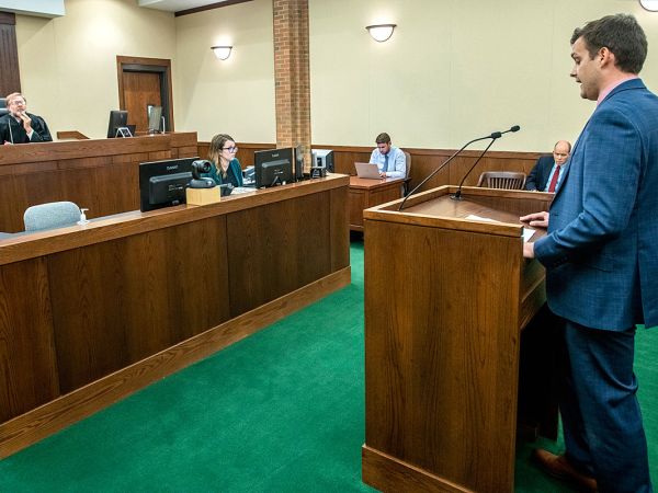 Rob Joki, a recent bankruptcy clinic student and UM law graduate, presents in Judge Benjamin Hursh’s courtroom.