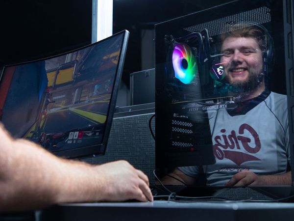 A picture of Jimmy Painter plays a video game. 