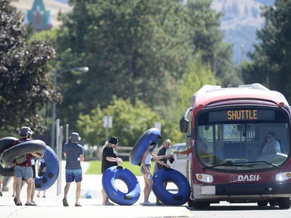A photo of floaters getting on UM's free Clark Fork River Recreation Shuttle.
