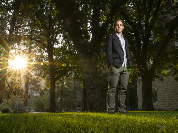 Luke Santore standing on campus