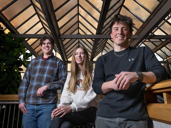 Photo of three students in the story.