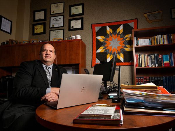 A picture of Kekek Stark in his UM law office.