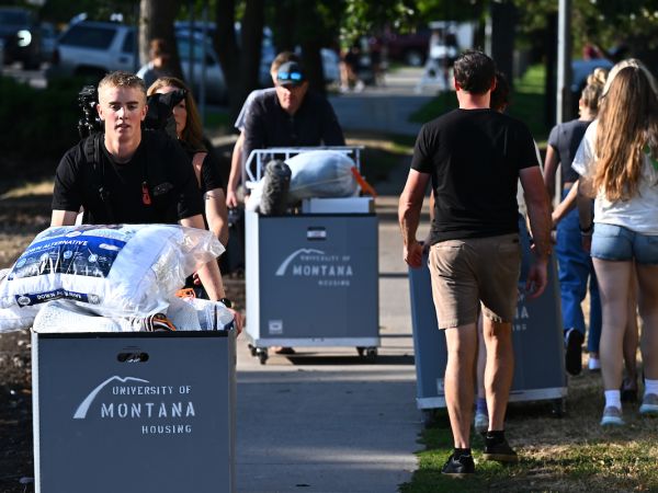 Students move in to their residence hall during fall 2024 Move-In Day.
