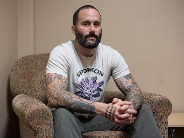 A picture of David Payseno in a chair.