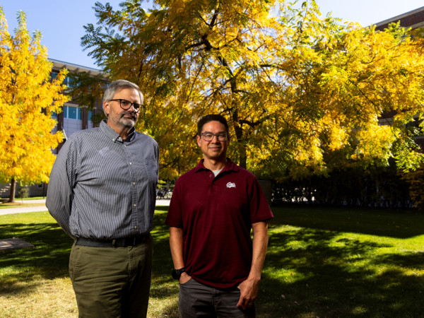 An image of Lee Banville, left, and Michael Cassens on campus. 