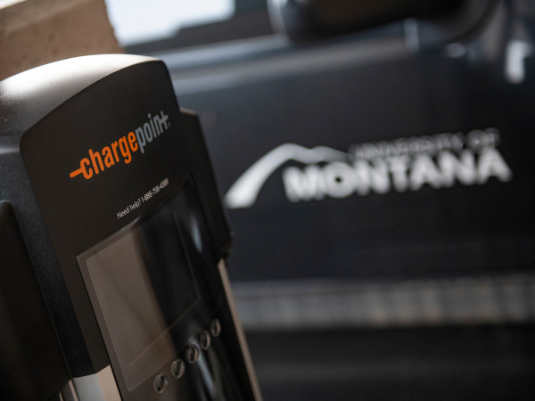 An electric car charger on campus 