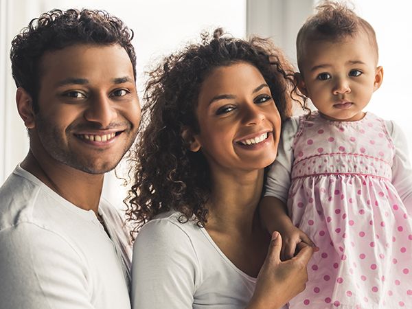 parents with their baby girl