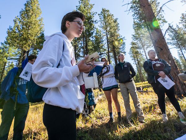 students collecting data in the field