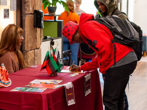 a group of students tabling 