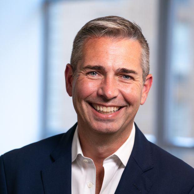 An image of Tom Lopach smiling