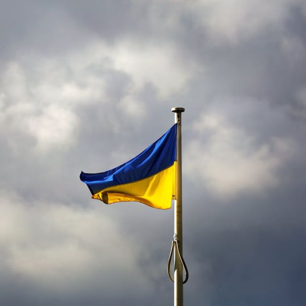 Ukrainian Flag waving in the wind with a cloudy background