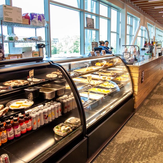 A student waits for his order at the Iris Coffee shop in Missoula College