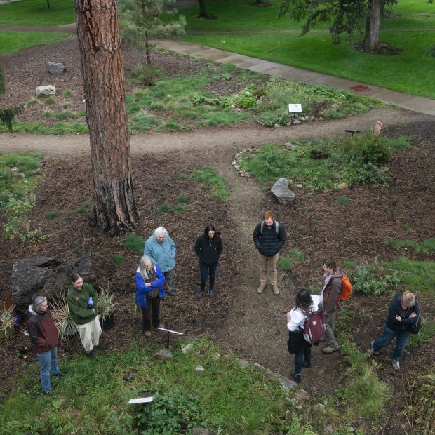 Areal Photo of a group taking a tour of the Ethnobotany garden