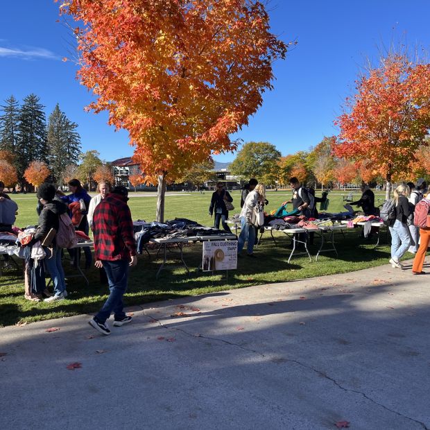 students shop the pop up clothing swap on the oval