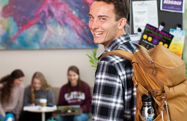 Photo of students in a common area.