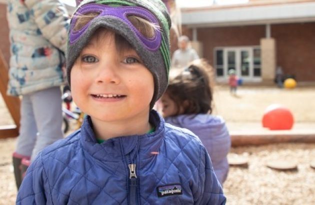 A young student on a playground