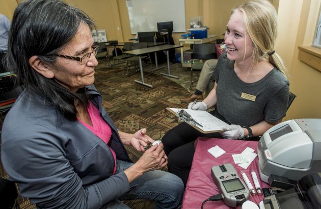 Patient talking with pharmacist