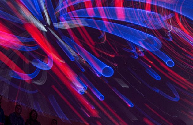 planetarium ceiling displaying whirling light show
