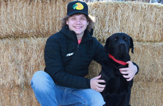 Conrad High School senior Brady Barnhill, pictured with his dog Diesel.