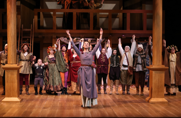 The 2017 cast of "As You Like It" raising their arms at curtain call. 