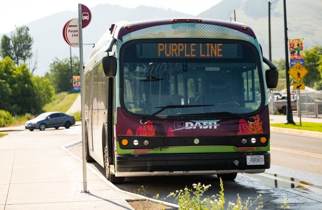 bus stopped at purple line bus stop on wyoming