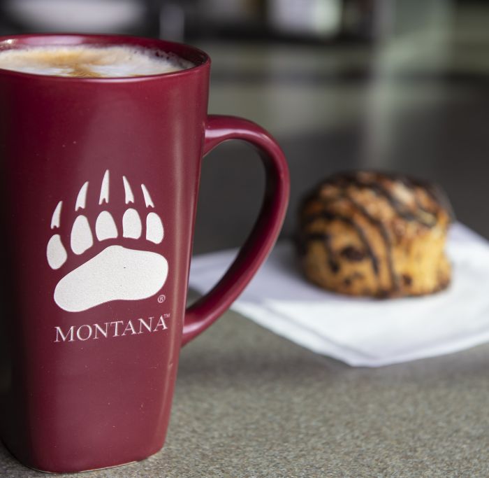 griz coffee cup and pastry